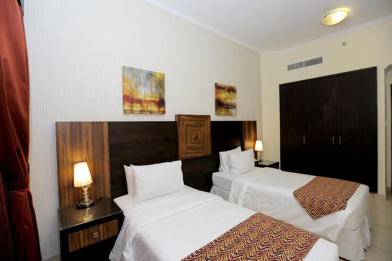 דובאי Ivory Grand Hotel Apartments מראה חיצוני תמונה